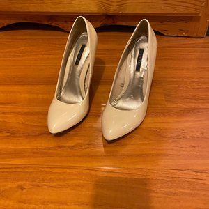 Cream colored pumps